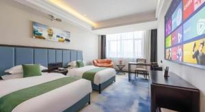 Postel nebo postele na pokoji v ubytování GreenTree Inn Hami Railway Station Bayi Road + 69 fotografií