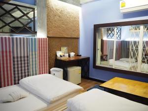 Postel nebo postele na pokoji v ubytování Day Hotel Khon Kaen