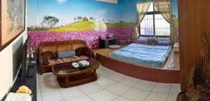 Postel nebo postele na pokoji v ubytování 山頂洞人