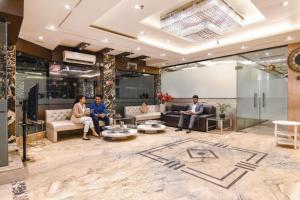 Oaspeți care stau la FabHotel Prime Goodwill