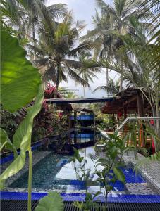 Bazén v ubytování Red Coconut Villa nebo v jeho okolí