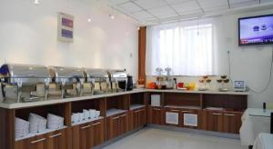 Η κουζίνα ή μικρή κουζίνα στο Beijing Yi Jia Hotel