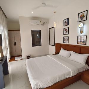 Ένα ή περισσότερα κρεβάτια σε δωμάτιο στο Hotel Arena Inn