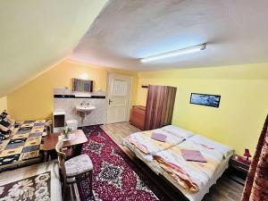 Postel nebo postele na pokoji v ubytování Vila Zdenka