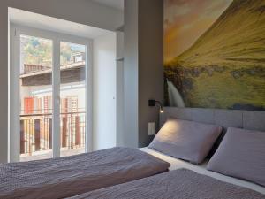 Postel nebo postele na pokoji v ubytování LIMIX Stays