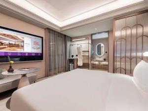 Μια τηλεόραση ή/και κέντρο ψυχαγωγίας στο Mercure Ningbo Yinzhou +47 φωτογραφίες