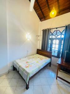 Ένα ή περισσότερα κρεβάτια σε δωμάτιο στο Sunshine villa