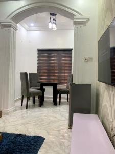 Posezení v ubytování Comfy Abode