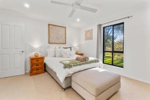 Ένα ή περισσότερα κρεβάτια σε δωμάτιο στο Balmurray House