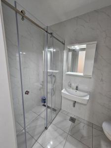 Ένα μπάνιο στο Apartman Urukalo