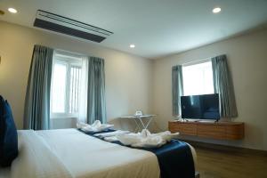 Et tv og/eller underholdning på Trunk and Trolley, Gachibowli, A Luxury Boutique Hotel, Hyderabad