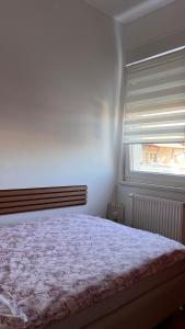 Postel nebo postele na pokoji v ubytování Stan na dan "Filippa" + 13 fotografií