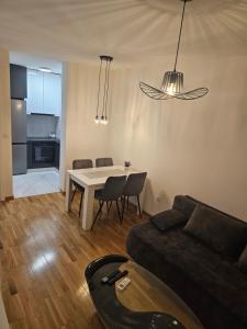 Η κουζίνα ή μικρή κουζίνα στο Apartman Urukalo