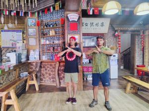 Majutusasutuse 张家界集结号公馆 Zhangjiajie Jijiehao Inn Avator Mountin-National Park-East Gate, Meeting Friends-Common Area-Poor teble-COFFEE-BEER-Laundry-Party, FREE Breakfast, Book tickets in advance, Chinese Calligraphy&Tea&Kung Fu Course külastajad