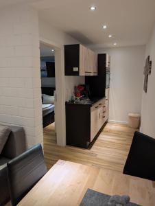 Kuchyň nebo kuchyňský kout v ubytování Stadtnah an der Förde 5704