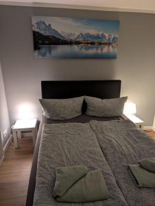 Postel nebo postele na pokoji v ubytování Stadtnah an der Förde 5704