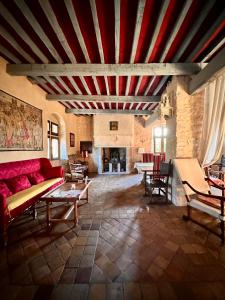 Et opholdsområde på Domaine La Lauren avec piscine chauffée et jacuzzi