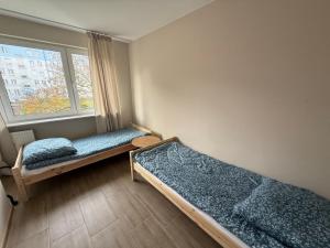 Voodi või voodid majutusasutuse Albert self check-in free parking toas