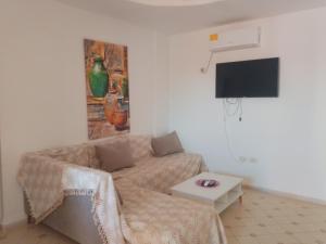 TV a/nebo společenská místnost v ubytování taguermess 2