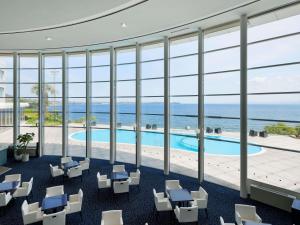 Bazén v ubytování Grand Mercure Beppu Bay Resort & Spa nebo v jeho okolí