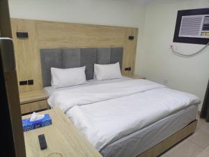 Voodi või voodid majutusasutuse العييري للشقق المخدومة toas