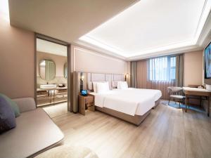 Postel nebo postele na pokoji v ubytování Mercure Shanghai Lujiazui + 104 fotografií