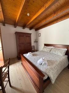 Ένα ή περισσότερα κρεβάτια σε δωμάτιο στο Agriturismo Verde Friuli +10 φωτογραφίες