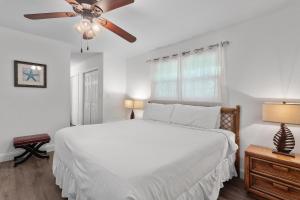 Ένα ή περισσότερα κρεβάτια σε δωμάτιο στο Beachy Keen +52 φωτογραφίες