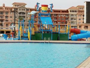 a pool with a water park with a water slide at Escape to Heaven in Sharm El Sheikh