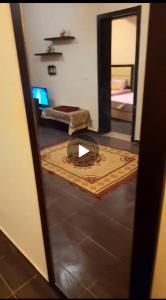 a view of a room with a bed and a mirror at Escape to Heaven in Sharm El Sheikh