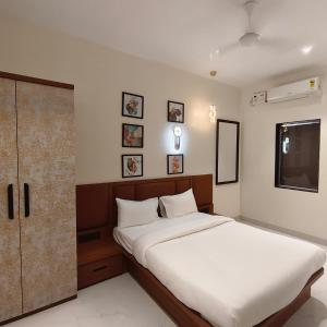 Ένα ή περισσότερα κρεβάτια σε δωμάτιο στο Hotel Arena Inn