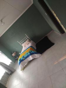 Ένα ή περισσότερα κρεβάτια σε δωμάτιο στο Mantimandze B&B +7 φωτογραφίες