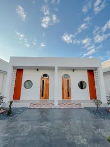 Foto  asuva majutusasutuse โกโก้ การ์เด้น รีสอร์ท galeriist