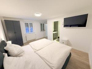 Voodi või voodid majutusasutuse Modernes Haus direkt am Rhein toas