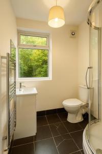 Koupelna v ubytování The Cozy House