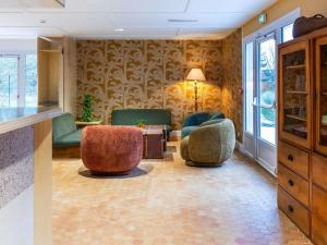 Posezení v ubytování greet Hotel Chatellerault