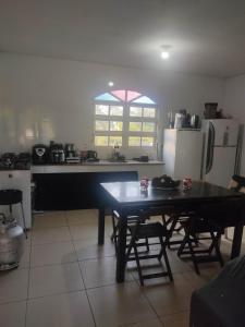 Kuchyň nebo kuchyňský kout v ubytování Casa Sossêgo + 26 fotografií