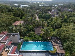 an aerial view of a resort with a swimming pool at Grand Mercure Goa Candolim - An Accor Hotels Brand in Candolim
