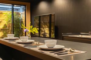 Foto sihtkohas Wada asuva majutusasutuse 難波站走路8分鐘包棟別墅 絕佳地理位置 最大16人 galeriist +27 fotot