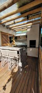 En balkon eller terrasse på Casa Vila Tamarindo Barra Grande + 6 billeder