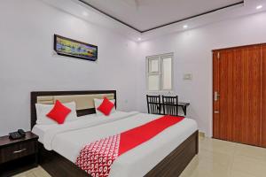 Giường trong phòng chung tại Hotel O A-One Unit Of Fantail Hospitality