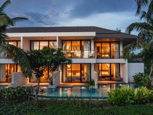 a rendering of a villa at night at South Palms Resort and Spa Panglao - MGallery Collection in Panglao