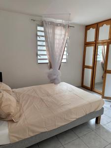 Voodi või voodid majutusasutuse Le Confort Double toas +2 fotot