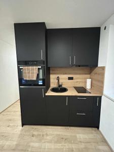 Kuchyň nebo kuchyňský kout v ubytování Die kleine Auszeit für Alleinreisende + 3 fotografie