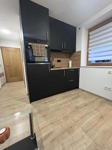 Kuchyň nebo kuchyňský kout v ubytování Die kleine Auszeit für Alleinreisende