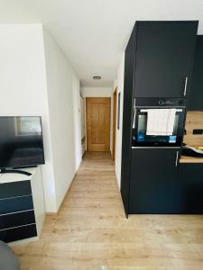 Kuchyň nebo kuchyňský kout v ubytování Die kleine Auszeit für Alleinreisende