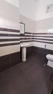 Ένα μπάνιο στο Kamal Homestay