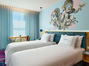 Voodi või voodid majutusasutuse 25hours Hotel Sydney The Olympia toas +103 fotot