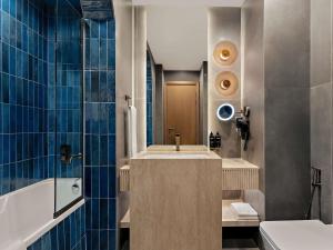 Ένα μπάνιο στο Mercure Abu Dhabi Downtown +61 φωτογραφίες