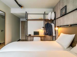 Katil atau katil-katil dalam bilik di ibis Bordeaux Nord Carbon Blanc